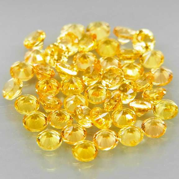 Fantastic 3.14ct diamond cut yellow Sapphire set