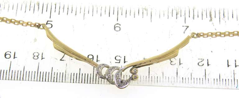 Powerful Yellow Gold Diamond Accent Bib Swirl Necklace