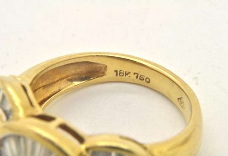 LADIES 18 KT YELLOW GOLD AND DIAMOND RING