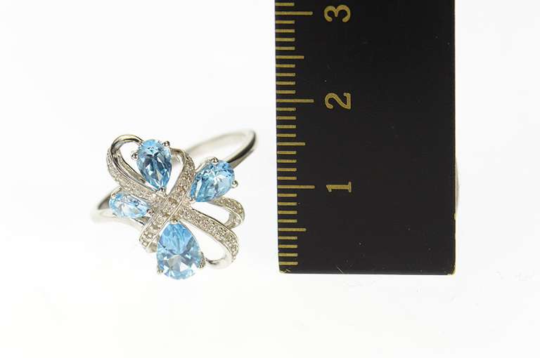10K White Gold Pear Blue Topaz Diamond Wavy Cluster Ring