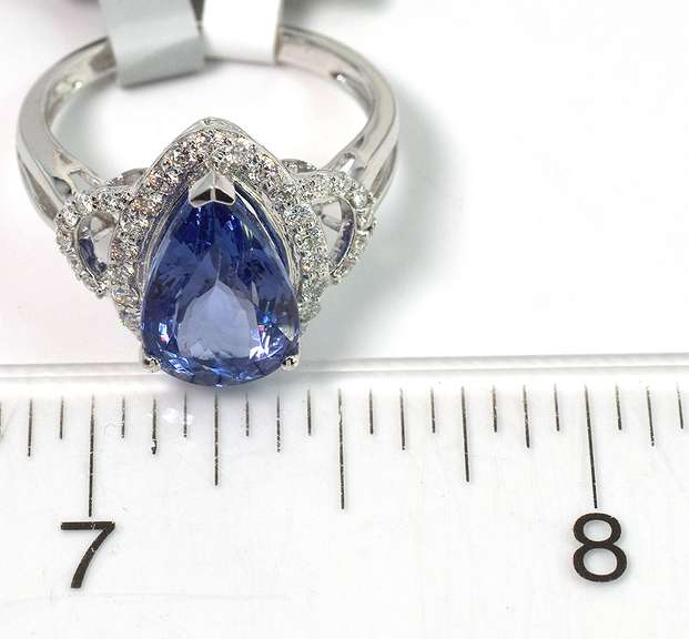 Entrancing 4.62CT Tanzanite & Diamond Ring in 18KT White Gold