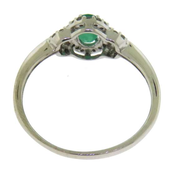 Charming Oval Emerald and Diamond Halo Ring