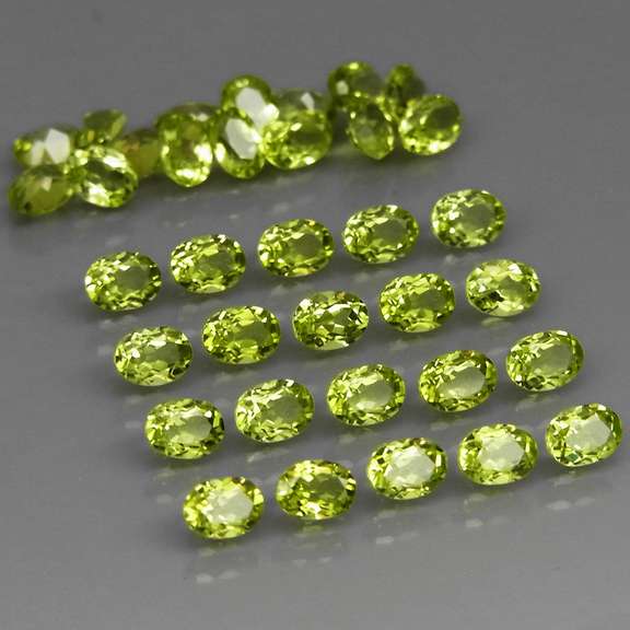 Real 6.75ct untreated apple green Peridot set