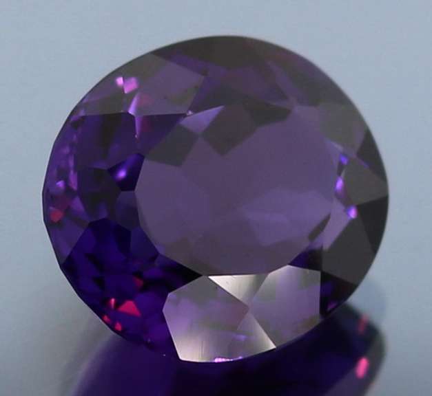 Deep purple 12.92ct oval cut created Amethyst