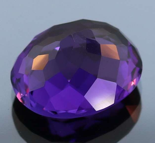 Deep purple 12.92ct oval cut created Amethyst