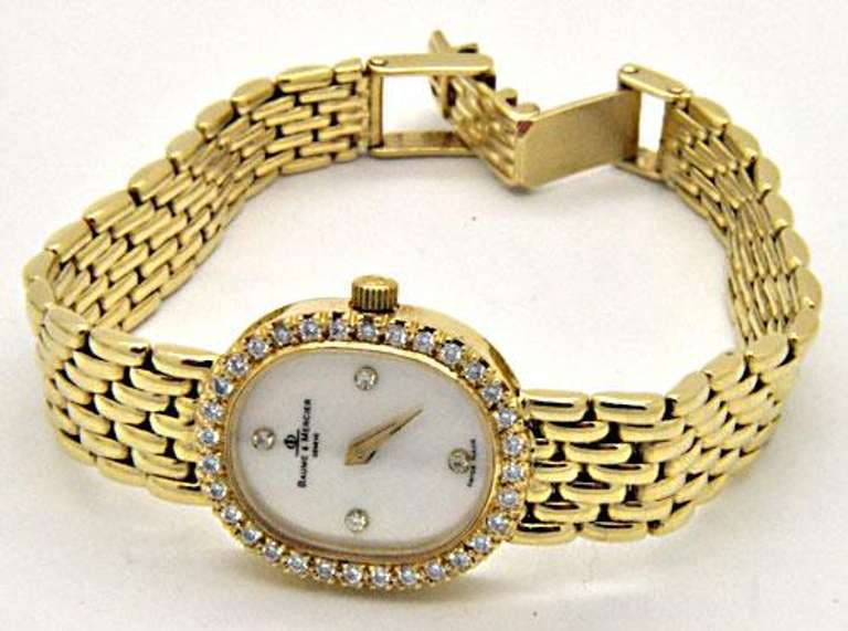 LADIES 14K GOLD & DIAMOND BAUME & MERCIER WATCH