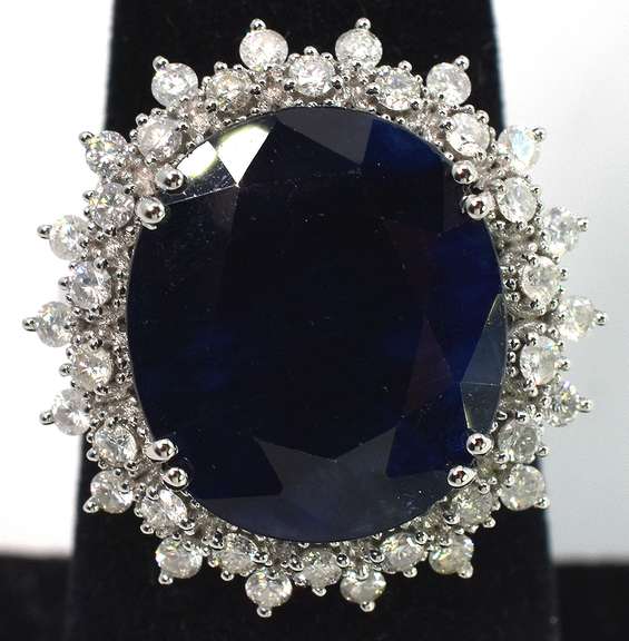 Mystifying Blue Sapphire & Diamond Halo Ring in 14KT White Gold
