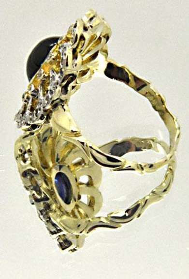 LADIES 14 KT TWO TONE DIAMOND AND SAPPHIRE RING.