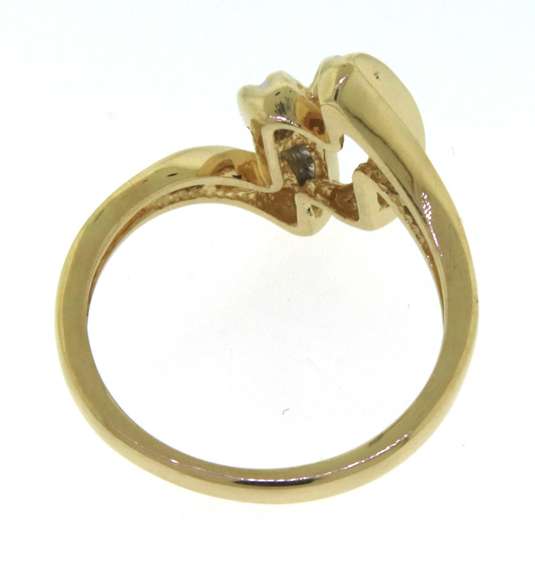 Playful Yellow Gold Twisted Swirl Diamond Ring