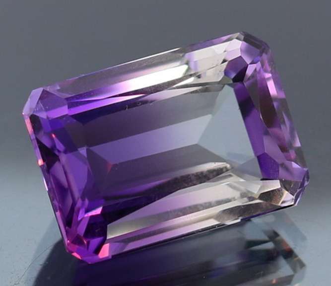 Beautiful 21.29ct top color created Ametrine