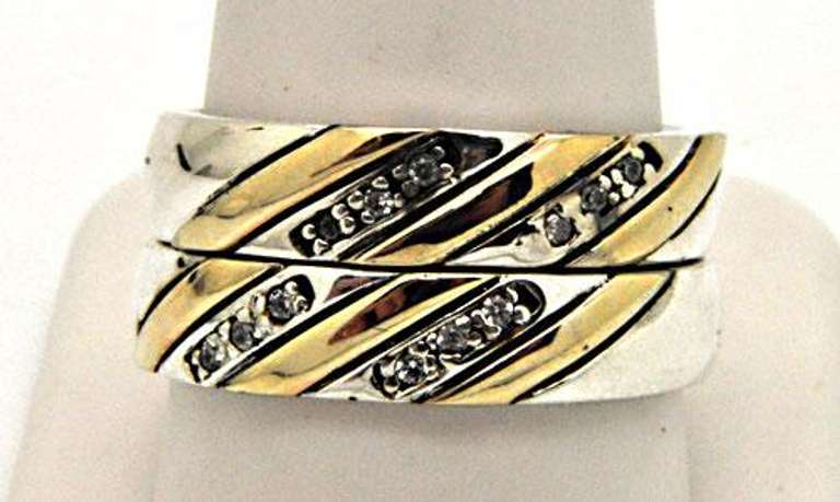 GOLD AND STERLING SILVER MATCHING BANDS.