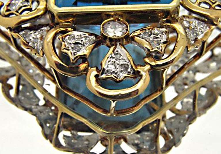 14 KT YELLOW GOLD BLUE TOPAZ AND DIAMOND PENDANT