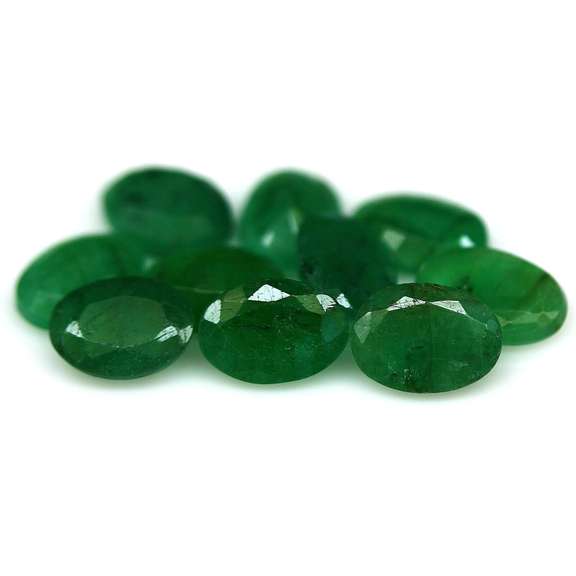 Oval cut 6.02ct Zambian Emerald set