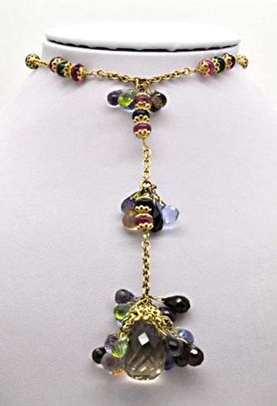 18KT YELLOW GOLD MIXED GEMSTONE BRIOLETTE NECKLACE.