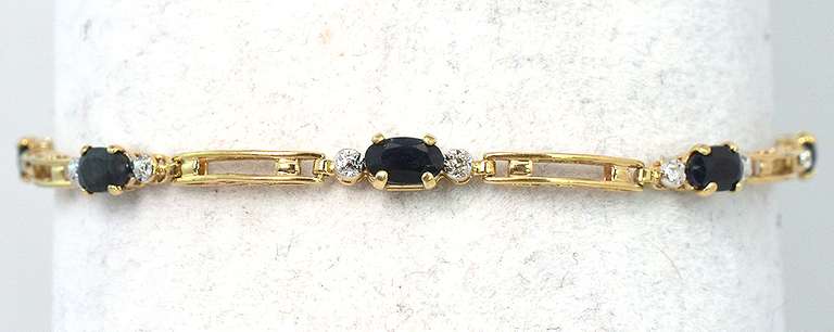 Classy 5-Stone Sapphire Bracelet in Yellow Gold