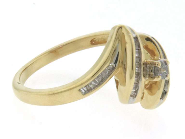Playful Yellow Gold Twisted Swirl Diamond Ring
