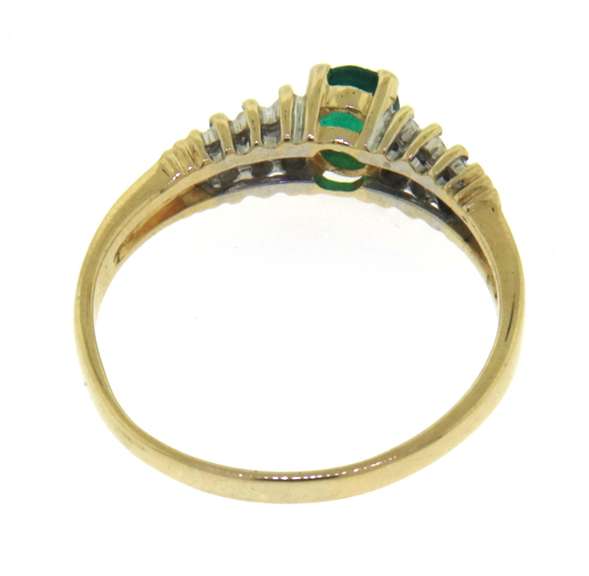 Fantastic Oval Cut Emerald & 2 Row Diamond Side Ring