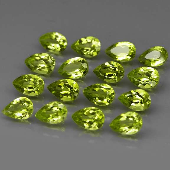 Pear cut! Unheated! 6.91ct Peridot set!
