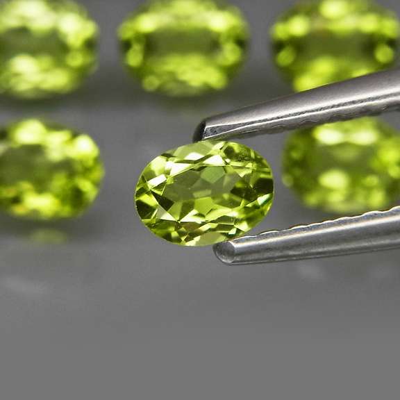 Real 6.62ct untreated apple green Peridot set