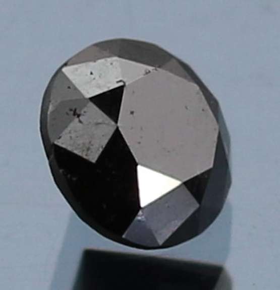 Very fine 1.12ct smooth cut Black Diamond solitaire