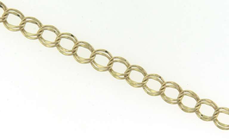 Powerful Yellow Gold Charm Bracelet