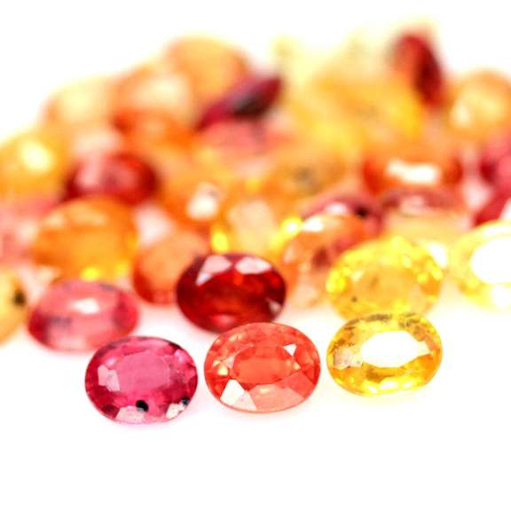 Stunning 9.44ct heated only Autumn leave Sapphire set