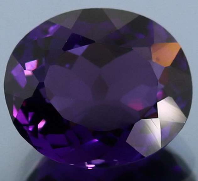 Deep purple 12.92ct oval cut created Amethyst