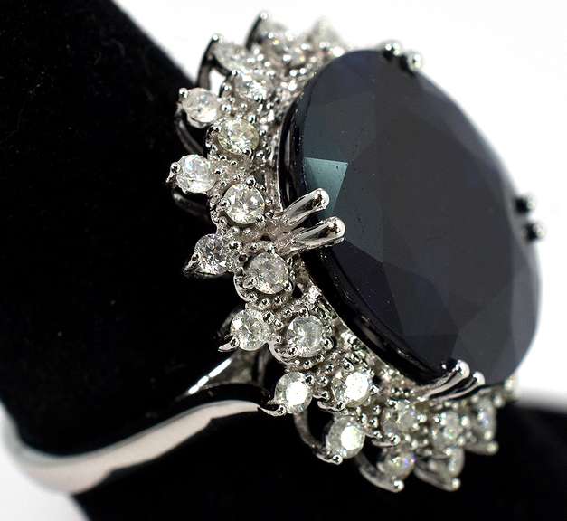 Mystifying Blue Sapphire & Diamond Halo Ring in 14KT White Gold