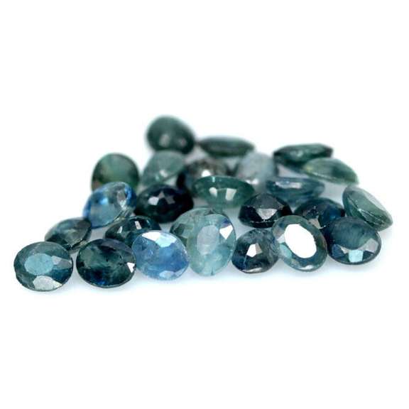 Heated only! 8.46ct blue green Sapphire set