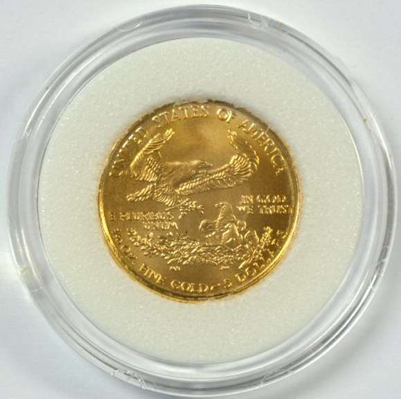 Superb Gem BU 1999 $1 American gold Eagle coin