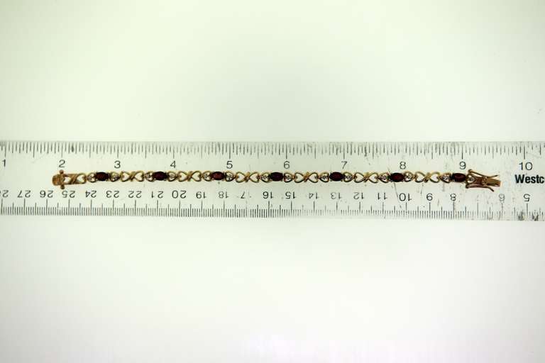Sterling Silver Garnet Heart Tennis Bracelet