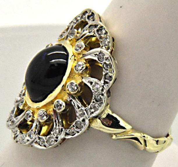 LADIES 14 KT TWO TONE DIAMOND AND SAPPHIRE RING.