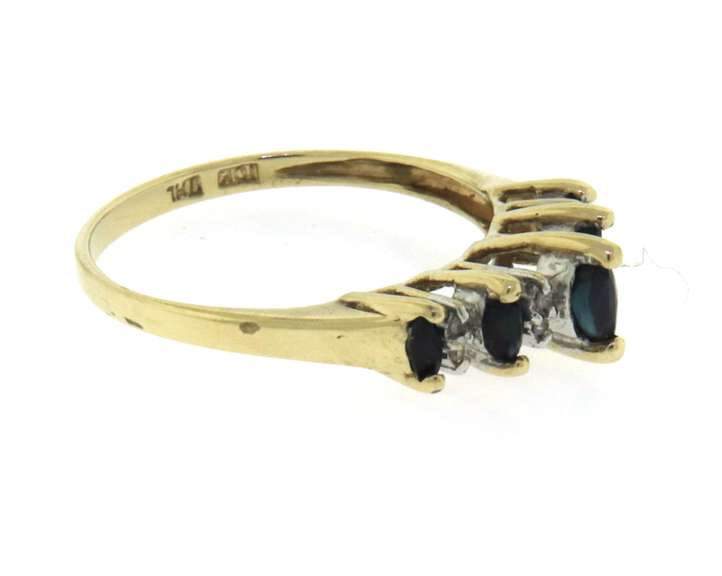 Elegant Yellow Gold Marquise Cut Sapphire & Diamond Accent Ring