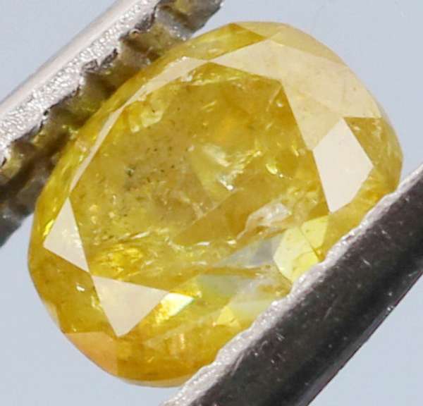 Rare .26ct oval cut yellow Diamond