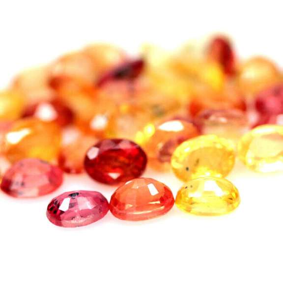 Stunning 9.44ct heated only Autumn leave Sapphire set