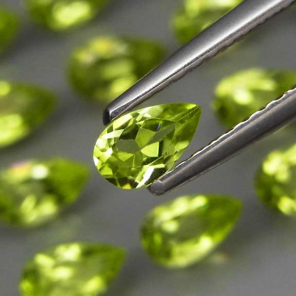 Pear cut! Unheated! 6.47ct Peridot set!