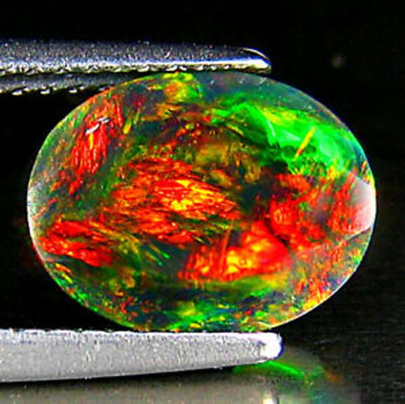 Captivating 1.44ct floral and fairy fire black Opal