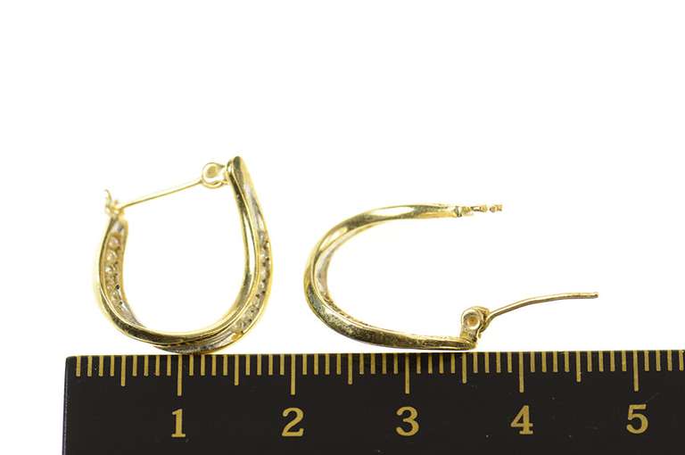 14K Yellow Gold Wavy Inside Outside Diamond Oval Hoop Earrings