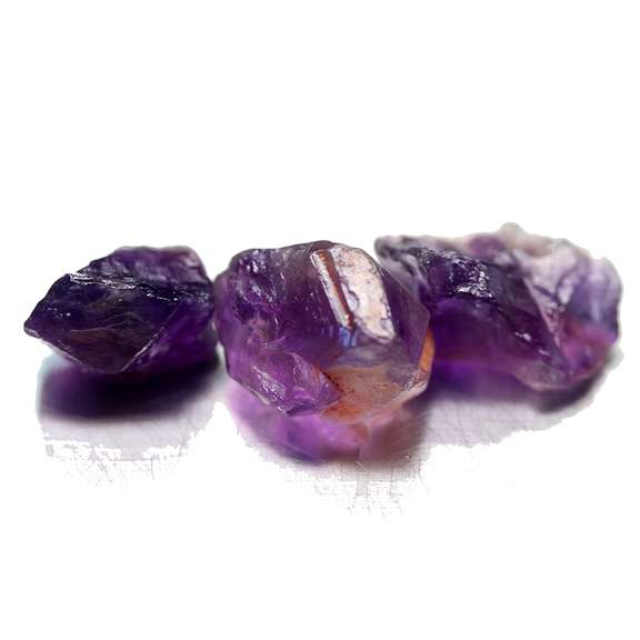 Collectors rich untreated 21.37ct uncut Amethyst set