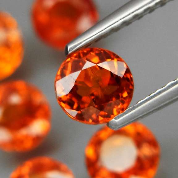 Exotic 4.38ct Mandarin Garnet set from Namibia