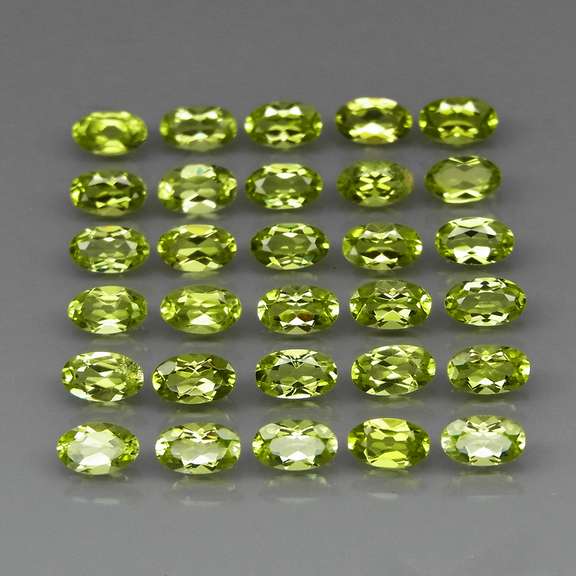 Real 7.55ct untreated apple green Peridot set