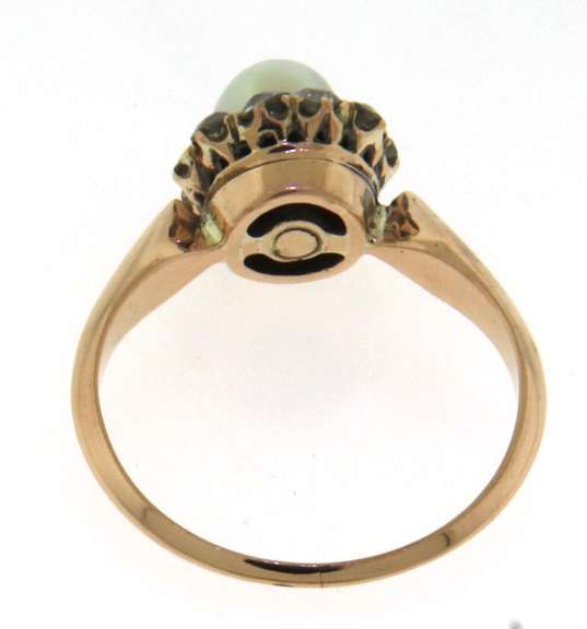 Trendy Yellow Gold Pearl and Diamond Halo Ring