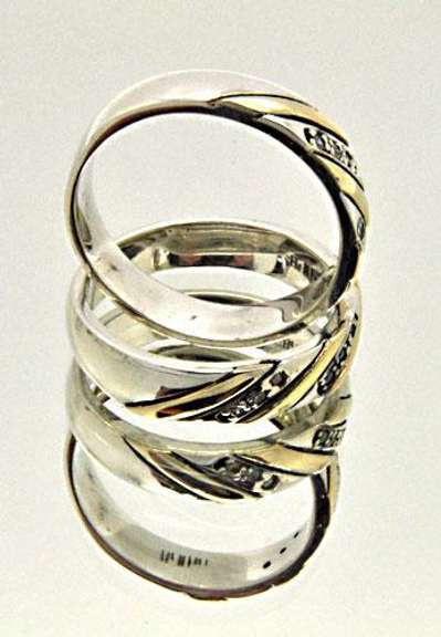 GOLD AND STERLING SILVER MATCHING BANDS.