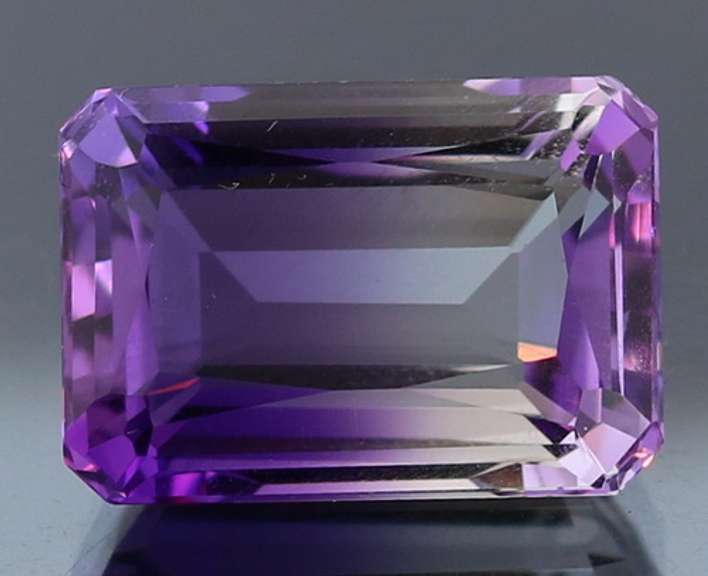 Beautiful 21.29ct top color created Ametrine
