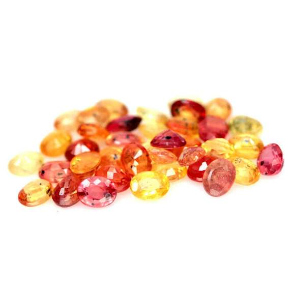 Stunning 9.44ct heated only Autumn leave Sapphire set