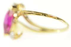10K Yellow Gold Diamond Accent Marquise Syn. Ruby Bypass Ring
