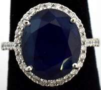 Impressive Sapphire & Diamond Halo Ring in 18KT White Gold