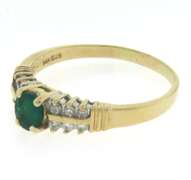 Fantastic Oval Cut Emerald & 2 Row Diamond Side Ring