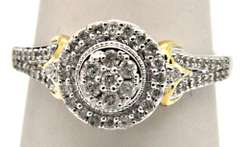 14KT WHITE GOLD DIAMOND RING WITH YELLOW GOLD ACCENTS.