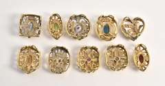 Useful Group of 10 Filigree Sliders